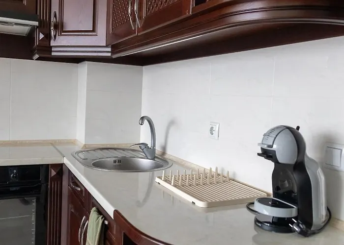 в центъра на *